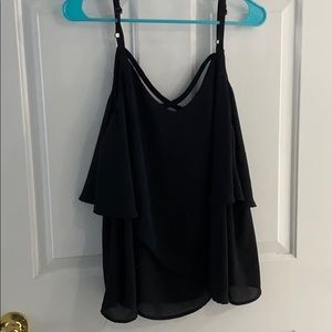 Black chiffon top.